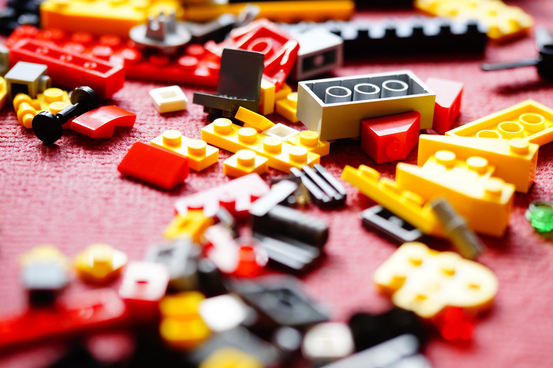 Legos spread out on table.