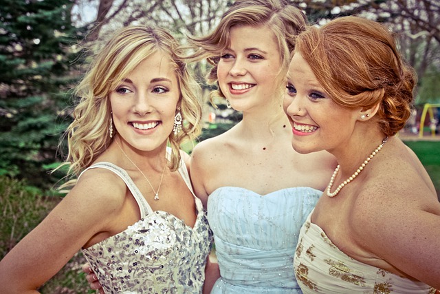 three teens in formal wear