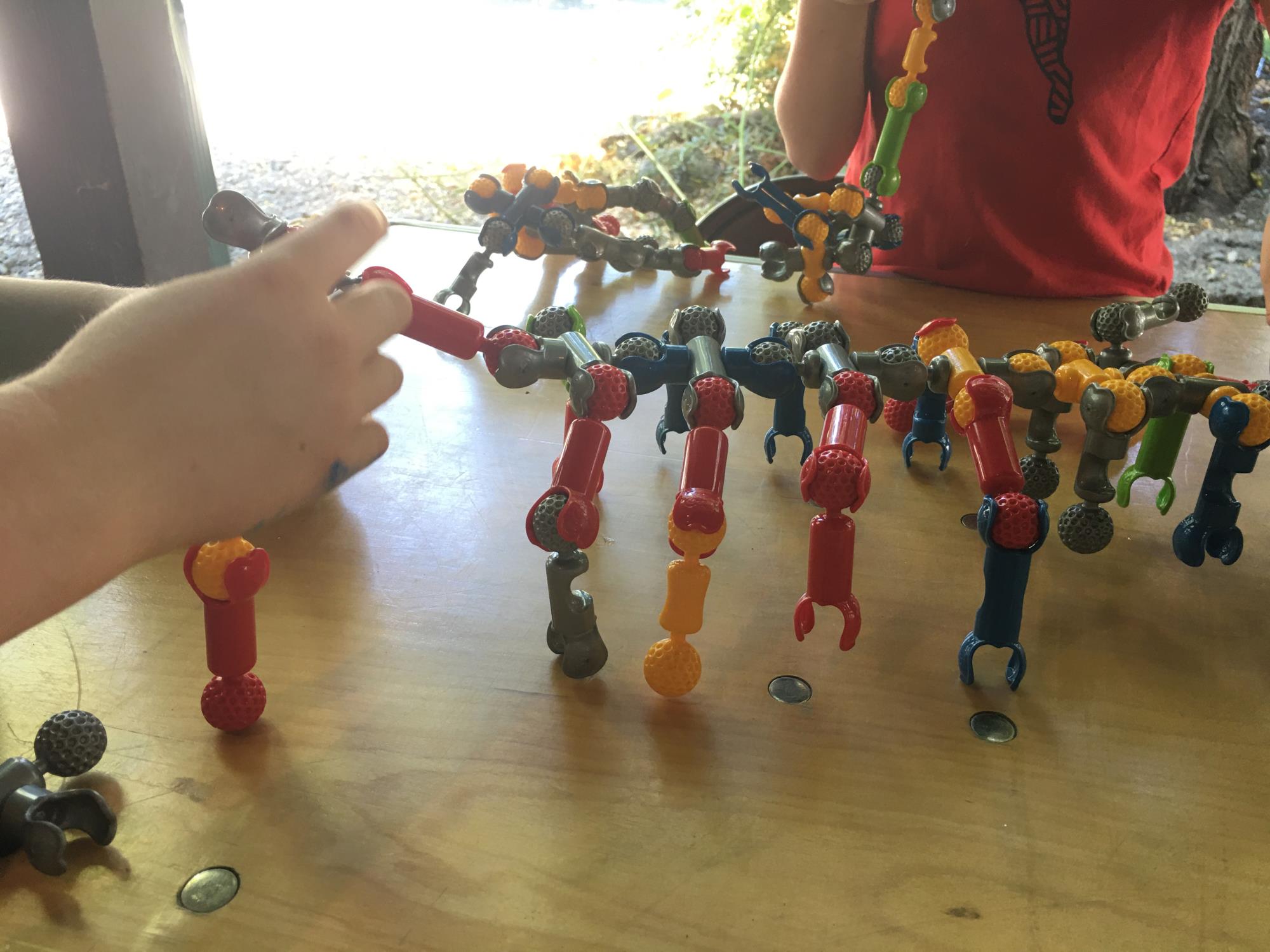 Kids playing with colorful building toys