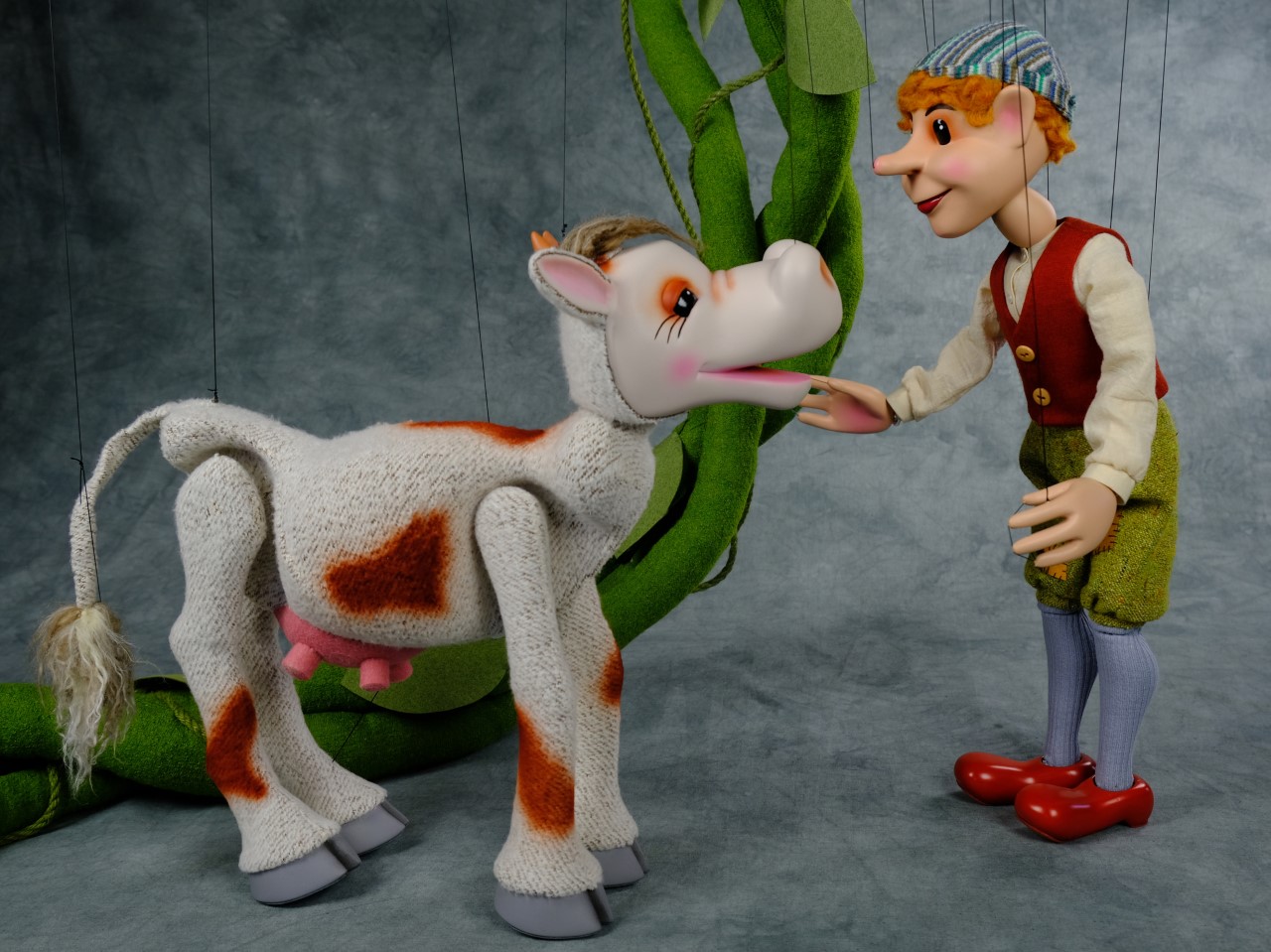 marionettes of cow and boy